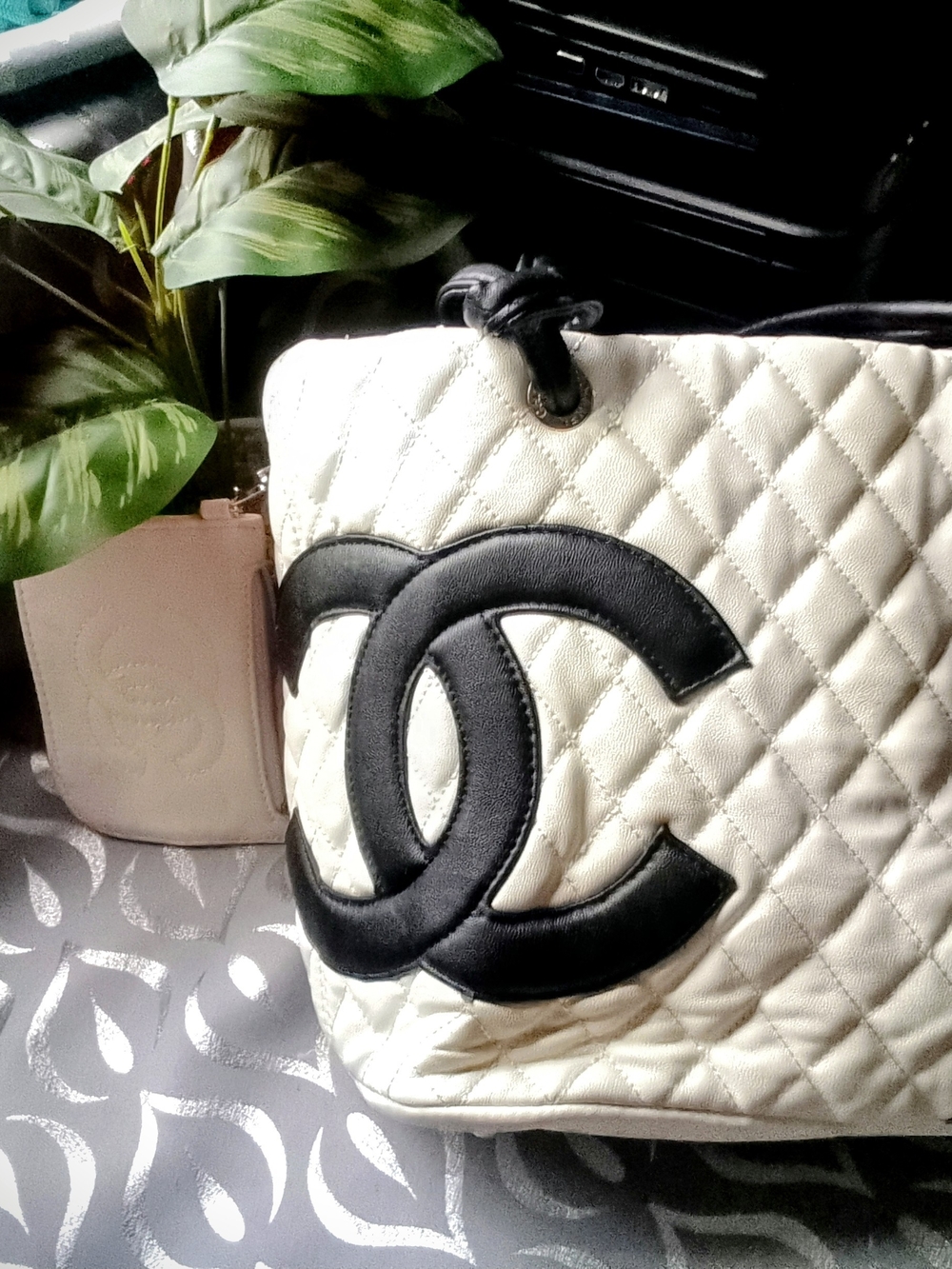 CHANEL White Quilted Tote with Black CC Emblem